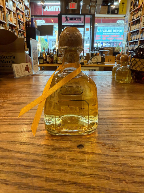 Patron Anejo 200mL clear bottle with cork top.