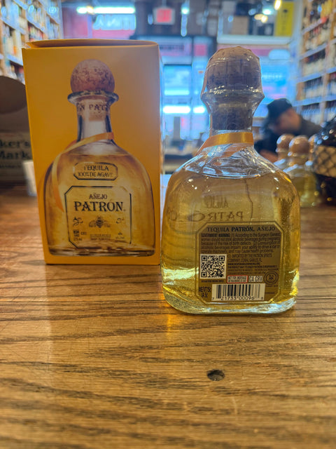 Patron Anejo 375mL clear bottle with cork top.