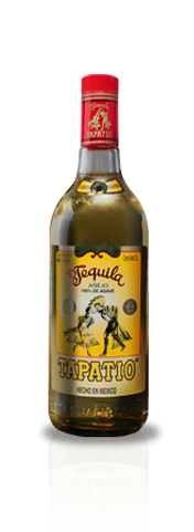 Tapatio Añejo 750ml a high shouldered clear glass bottle with a yellow label and red top