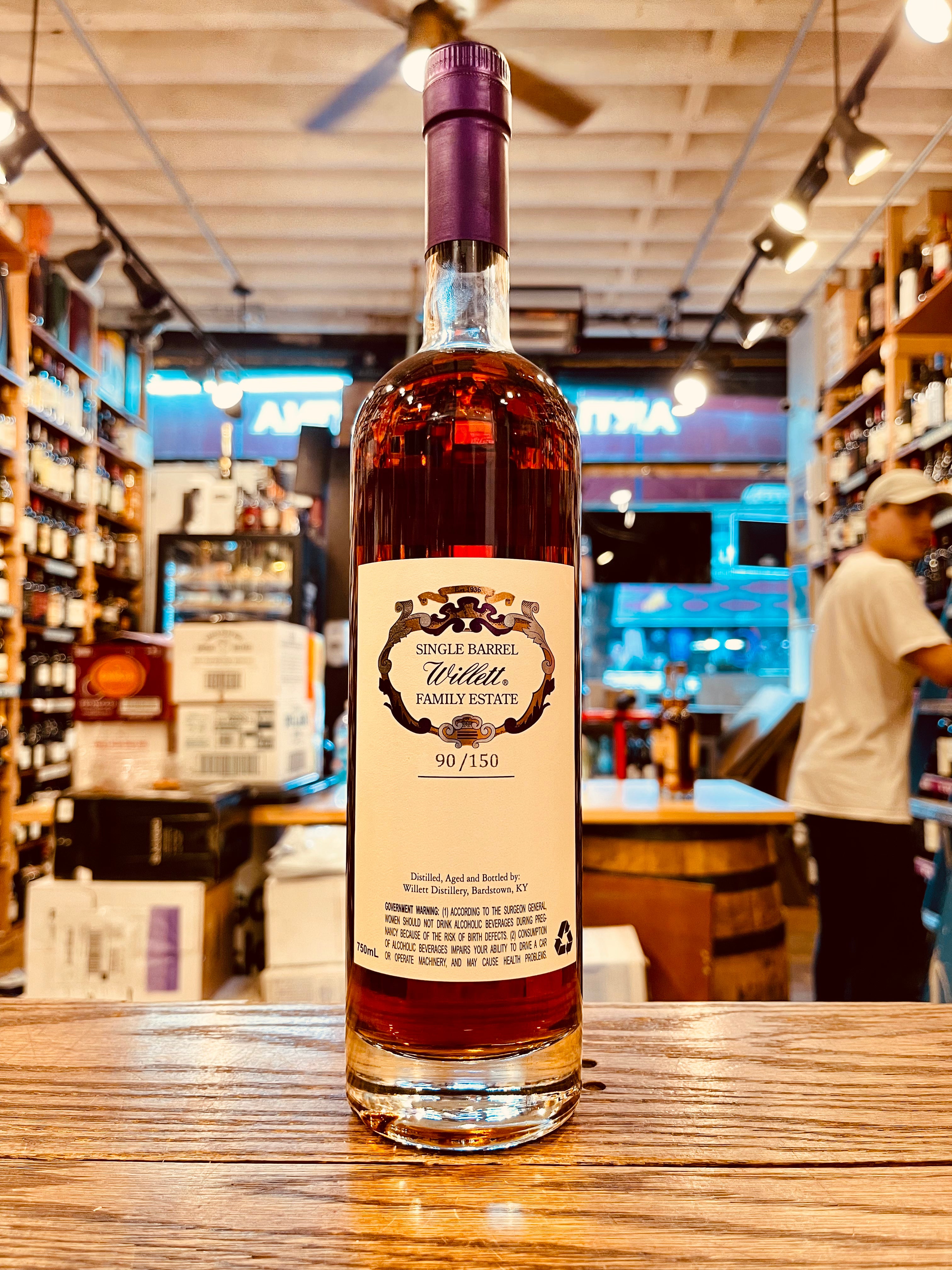 Willett Straight Kentucky Bourbon Rare Release 9Yr 750mL the backside of a clear glass bottle with a beige label and a purple top 