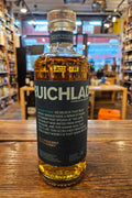Bruichladdich 18 Aged Years Islay Whisky 750mL a cylinder shaped clear glass bottle with a blue label and glass top