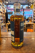 Bruichladdich 18 Aged Years Islay Whisky 750mL a cylinder shaped clear glass bottle with a blue label and glass top