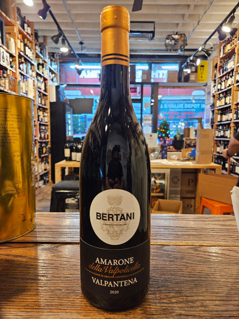 Bertani Amarone della Valpolicella Valpantena 2020 750mL a dark glass wine bottle with a circular white label and a golden top