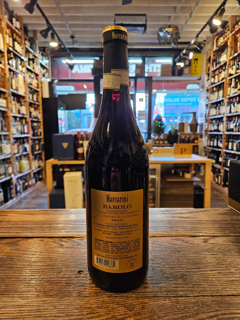 Marcarini Barolo 2019 750mL a dark glass wine bottle with a golden label and a black top