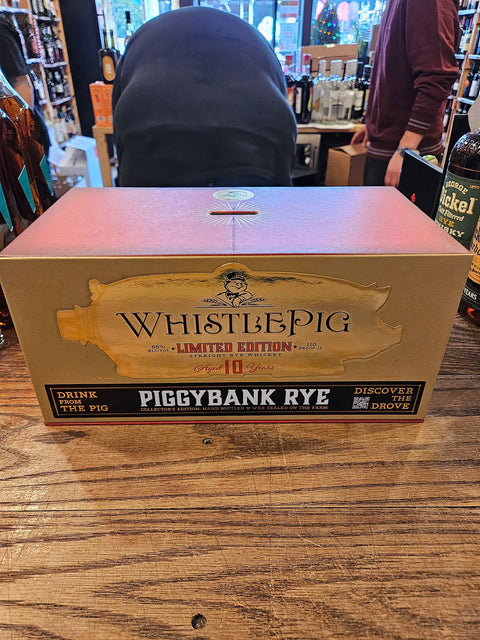 Whistle Pig Piggy Bank Rye 10 Year Limited Edition 750mL a gold colored box with a piggy bank on it