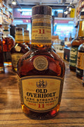 Old Overholt 11 Year Old Cask Strength Straight Rye Whiskey 750mL a stubby clear glass bottle with a beige label and wooden top
