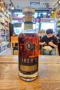 Baker's 7 Year Single Barrel High Rye Bourbon Limited Release 750mL a clear cylinder glass bottle with a black label and a metal top