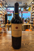 Masseto Massetino 2022 750mL a dark glass wine bottle with a brown label and black top