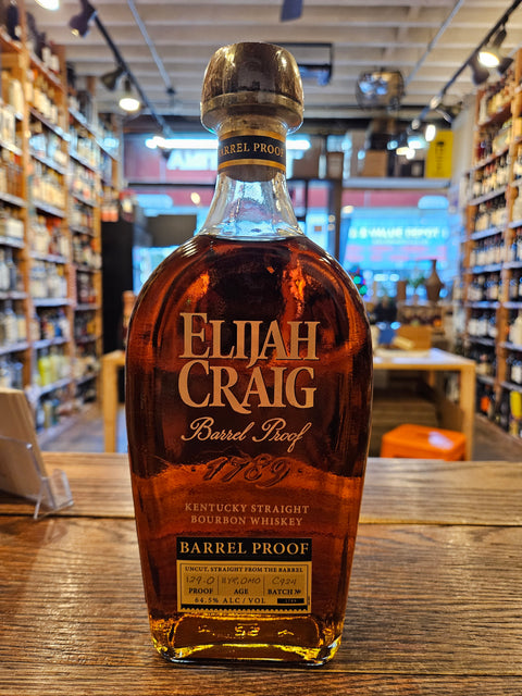 Elijah Craig Bourbon Barrel Proof 11YR Batch C924 750mL a round shouldered clear glass bottle with white lettering and a wooden top