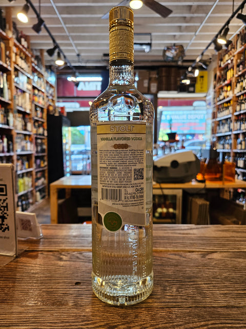 Bottle of alcohol with a blurred indoor setting