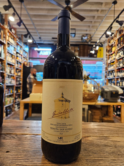 Wine bottle with label on a wooden surface in a store setting