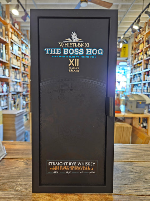 Whiskey box with 'The Boss Hog' branding on a wooden surface.