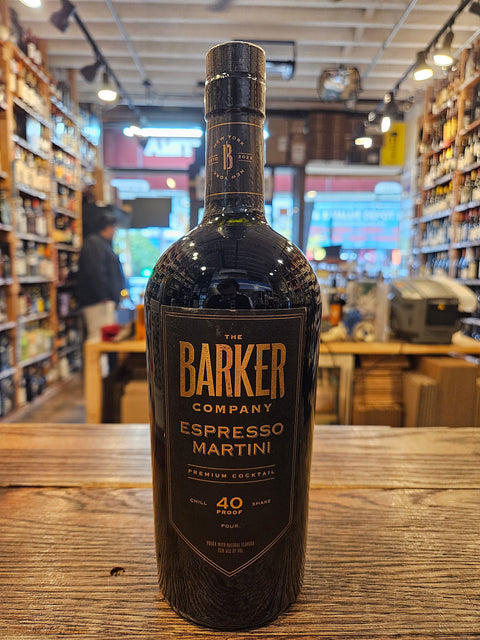 Bottle of Barker Company Espresso Martini on a wooden surface with a store interior in the background