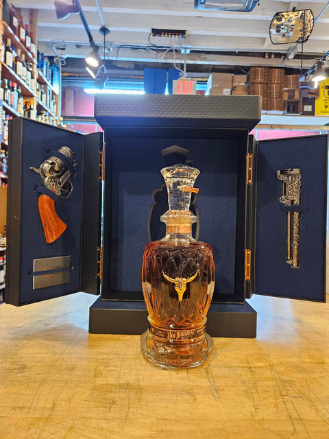 Decorative bottle with intricate design on a wooden surface