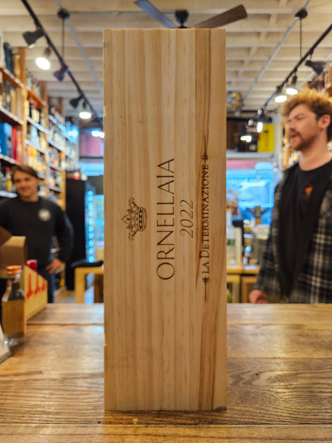 Wooden box with 'Ornetalia' branding in a store setting