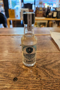 Bottle of El Bandido Tequila on a wooden surface