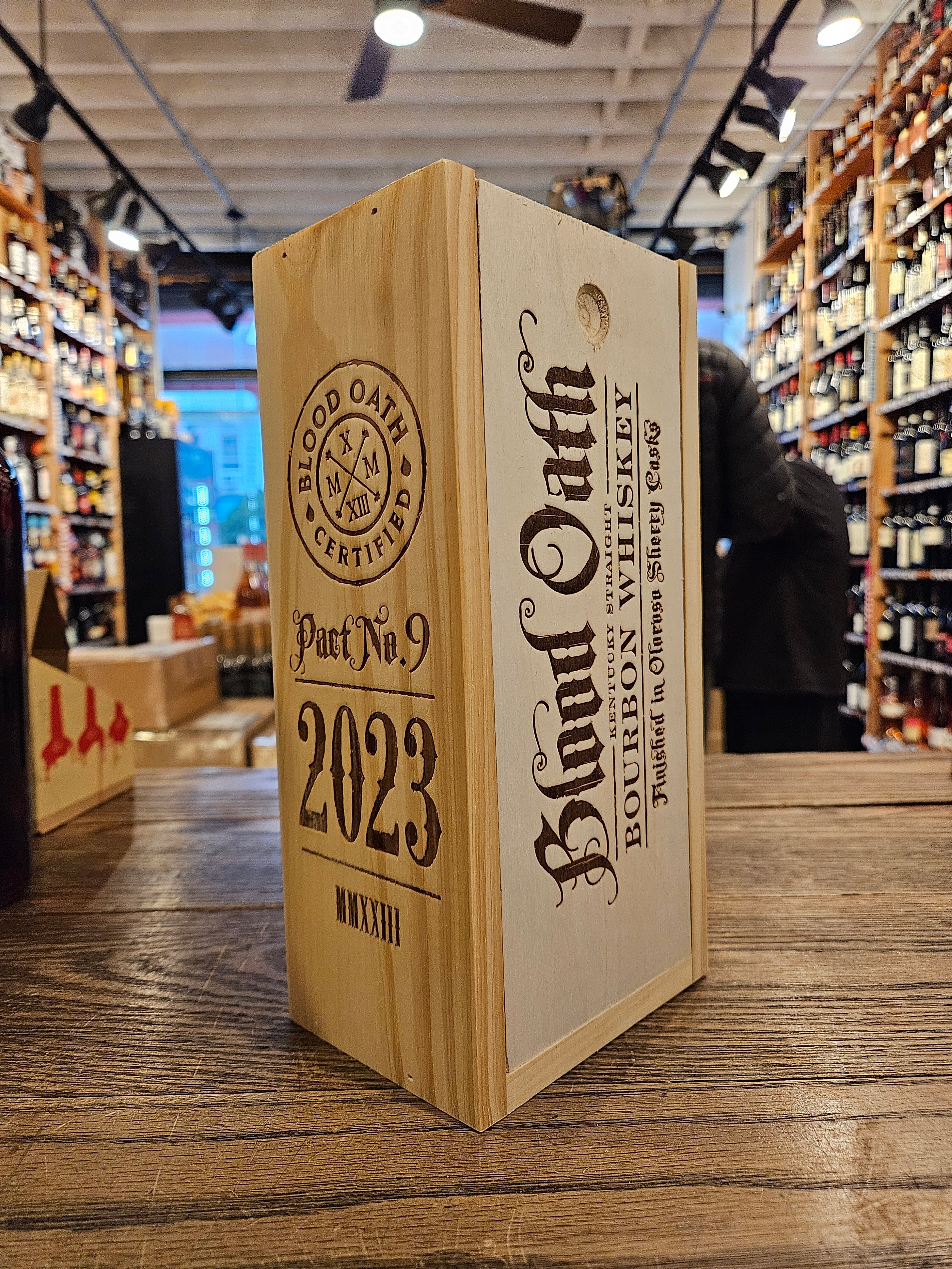 Blood Oath Bourbon Whiskey Pact No 9 750mL a squared wooden box with burnt in lettering 