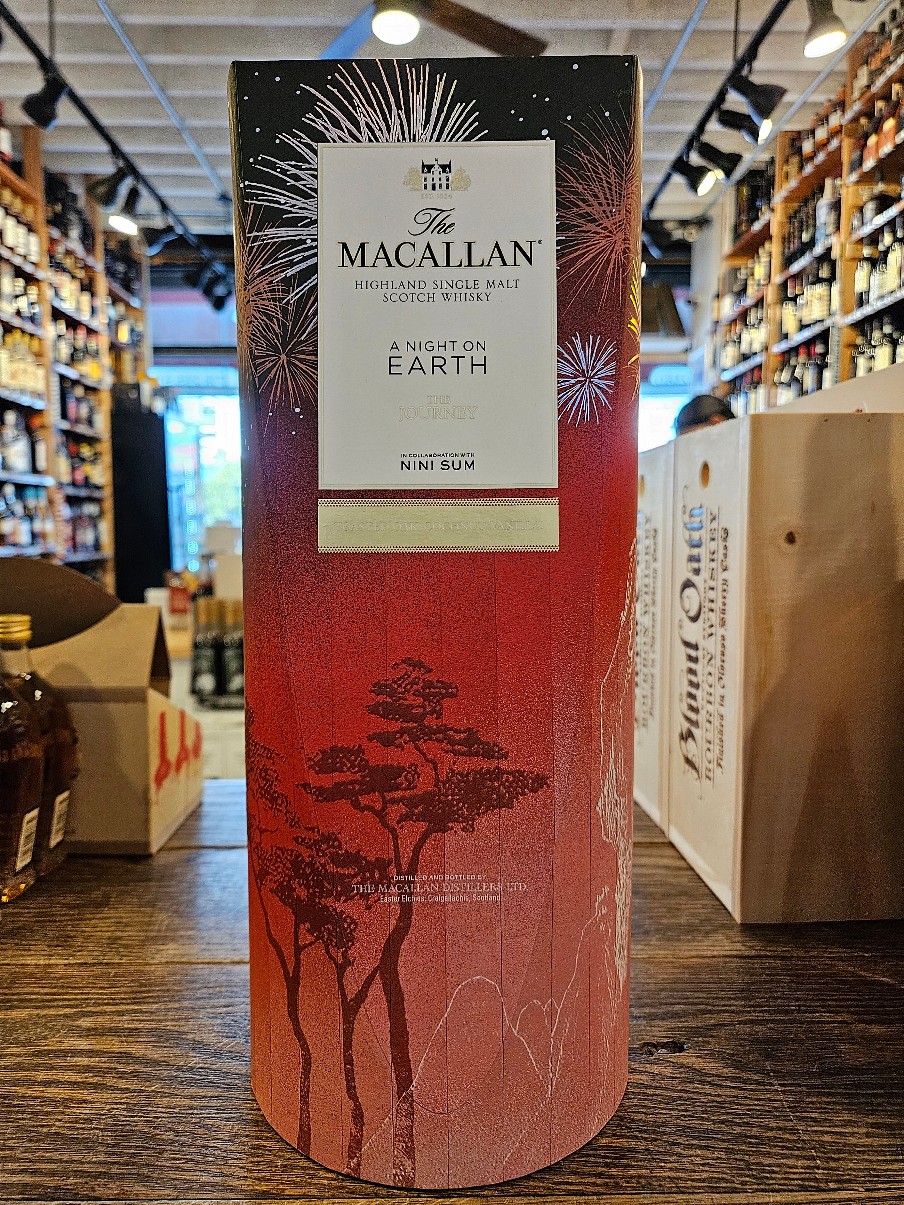 Macallan A Night on Earth - The Journey 750mL a colorful orange and black box with a white label