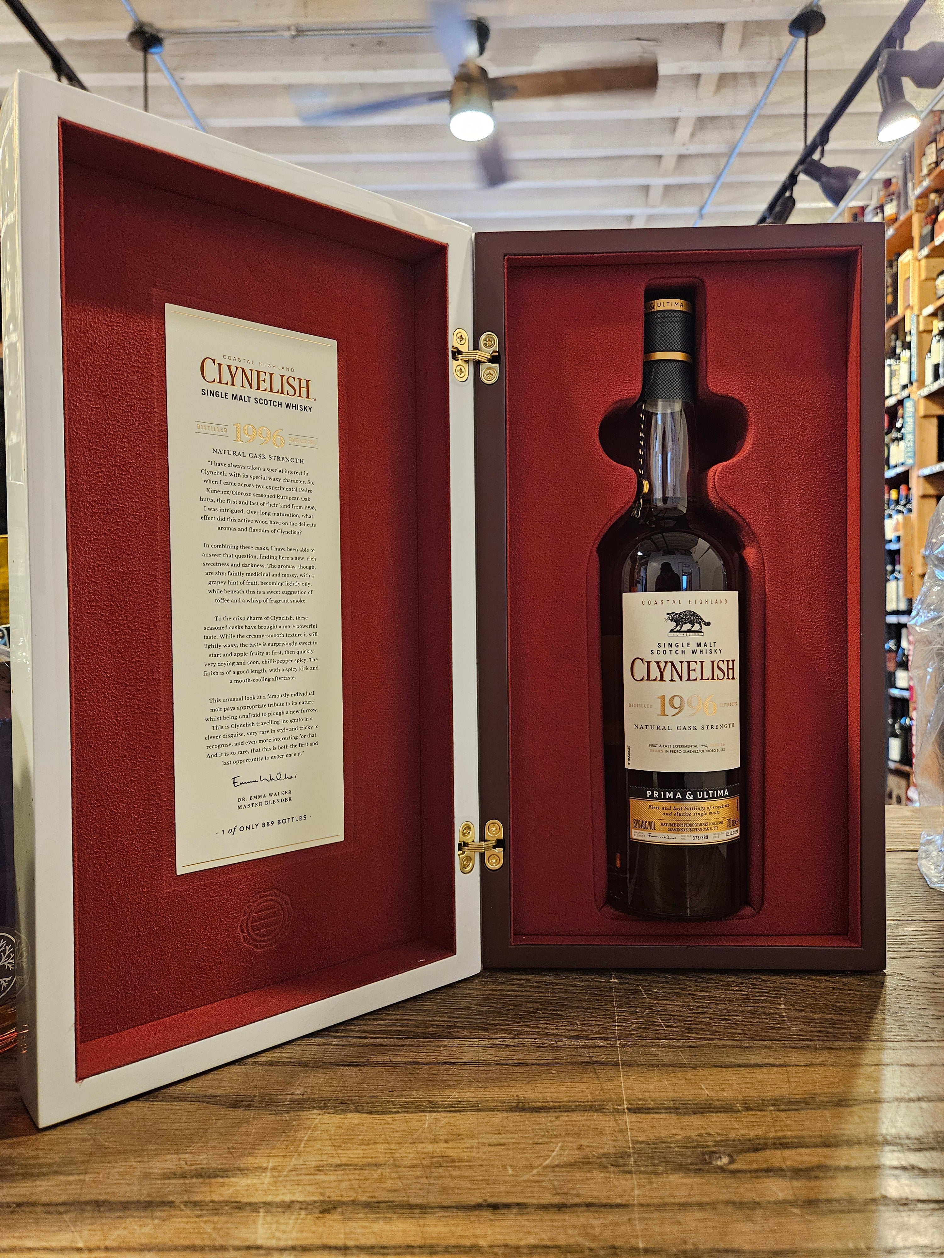 Clynelish 1996 Single Malt Scotch Whisky Prima and Ultima Fourth Release an open case with red velvet lining with a tall slender necked bottle inside with a white label