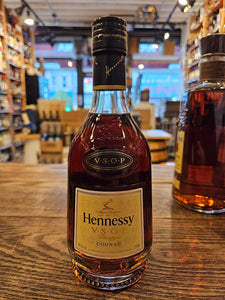 Hennessy VSOP 375mL a clear glass bottle with tapered neck and a gold label and black top