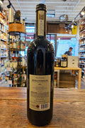 Val di Suga Brunello di Montalcino 2015 750mL a dark glass wine bottle with a beige label and black top.