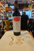 Chateau Mouton Rothschild Pauillac 2021 750mL a dark glass wine bottle with a white label and a maroon top