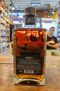 Woodinville 8 Year Straight Bourbon Whiskey 750mL a squared clear glass bottle with a black label and black top
