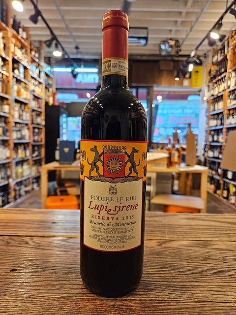 Podere Le Ripi Brunello di Montalcino Riserva Lupi e Sirene 2015 750mL a dark glass wine bottle with a yellow and beige label with a red top