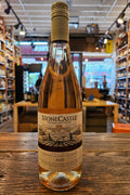 Stone Castle Rose 750mL clear glass wine bottle with a white label and gold top