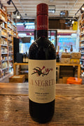 Planeta La Segreta Nero D'Avola 750mL a dark glass wine bottle with a white label and red top