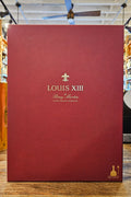 Louis XIII 750mL a deep red rectangular box with gold lettering on the front. 