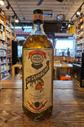 Ferrand Dry Curacao Orange Triple Sec 1L a squared clear glass bottle with a  white label and black top
