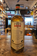Ferrand Dry Curacao Orange Triple Sec 1L a squared clear glass bottle with a  white label and black top