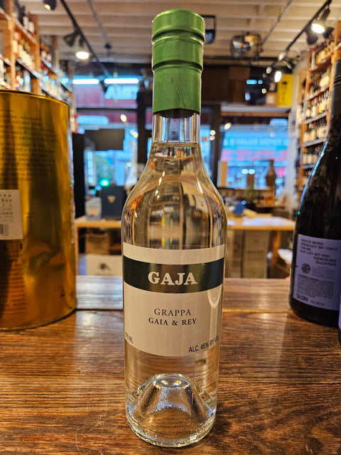 Gaja Grappa Gaia & Rey 375mL a short clear glass bottle with a white label and a green top