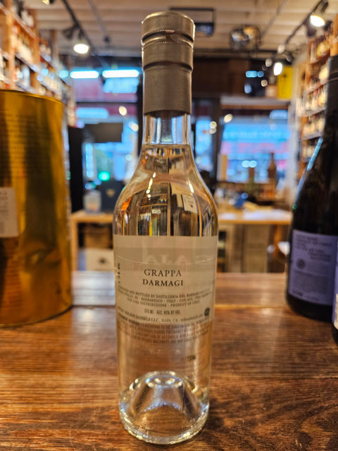 Gaja Grappa Darmagi 375mL a clear short glass bottle with a silver top