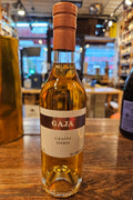 Gaja Grappa Sperss 375mL a short clear glass bottle with a white label and a rose gold top