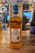 Y.A. Bakemono - Double Cask Single Malt Whisky 700mL a clear glass bottle with rounded shoulders and a beige label with an aqua blue top