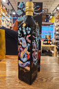 Johnnie Walker Blue Label Year of the Snake Lunar New Year 750mL a dark glass bottle with colorful art work and a golden top