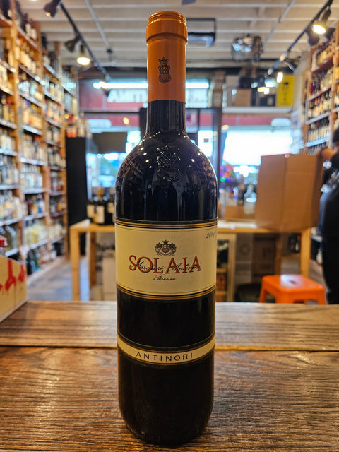 Solaia Antinori 2021 750mL a dark glass bottle with a beige label and orange top