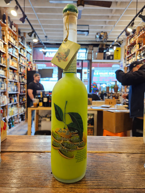 Sogno Di Sorrento Crema di Pistacchio 750mL a tall long necked frosted clear bottle with pistachios on the label with a green top