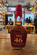 Maker's Mark 46 French Oaked 750mL a round shouldered clear glass bottle with a red label and a red wax top