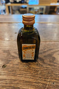 Cointreau 50mL small squared dark glass bottle with a white label and a copper top