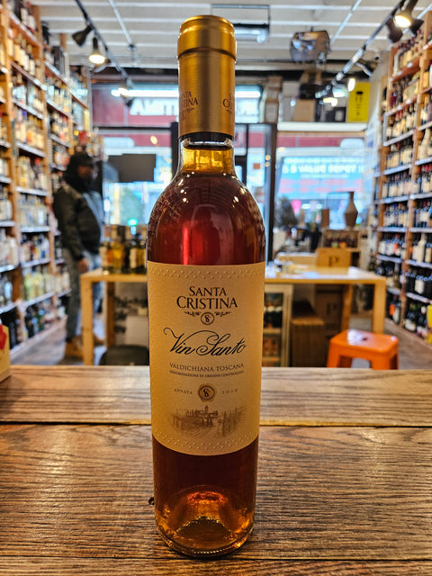 Vin Santo Santa Cristina Valdichiana 375mL 2019 a short clear glass bottle with a beige label and a golden top