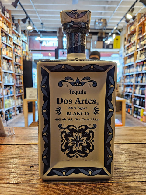 Dos Artes Tequila Blanco 1L a square ceramic white hand crafted bottle with blue paint 