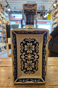 Dos Artes Tequila Blanco 1L a square ceramic white hand crafted bottle with blue paint 