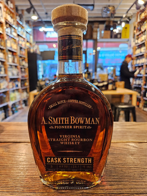 A. Smith Bowman Cask Strength Bourbon 750mL a flat front circular bottle with a wooden cork