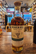 Heaven Hill Grain to Glass Kentucky Straight Rye Whiskey 750mL a tall round shouldered clear glass bottle with a white label and a wooden topper
