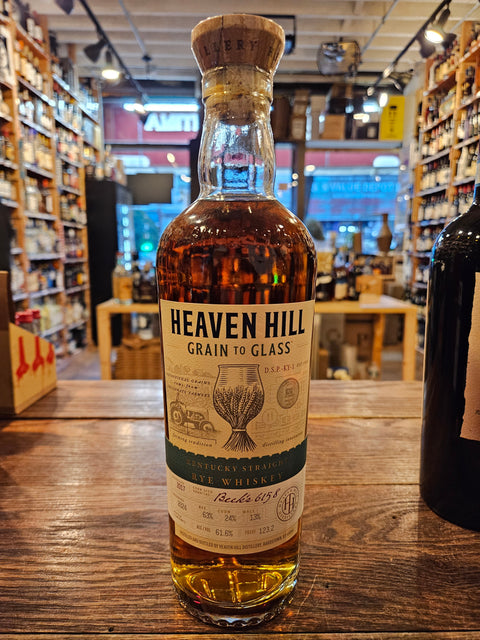 Heaven Hill Grain to Glass Kentucky Straight Rye Whiskey 750mL a tall round shouldered clear glass bottle with a white label and a wooden topper