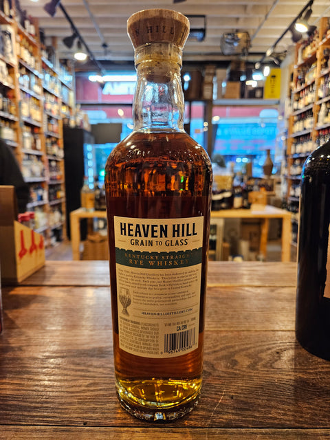 Heaven Hill Grain to Glass Kentucky Straight Rye Whiskey 750mL a tall round shouldered clear glass bottle with a white label and a wooden topper