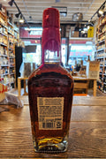Maker’s Mark Wood Finishing Series 2024 The Heart Release 750mL a clear glass bottle with robust shoulders and beige label and a red wax top.